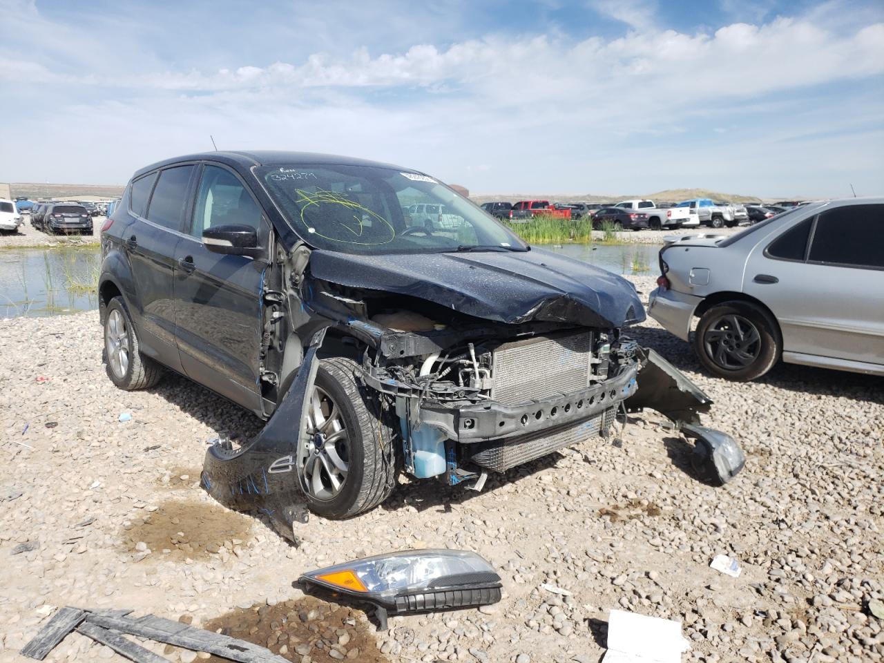 FORD ESCAPE SEL 2013 with VIN 1FMCU9H90DUC95877 - Photo from auction