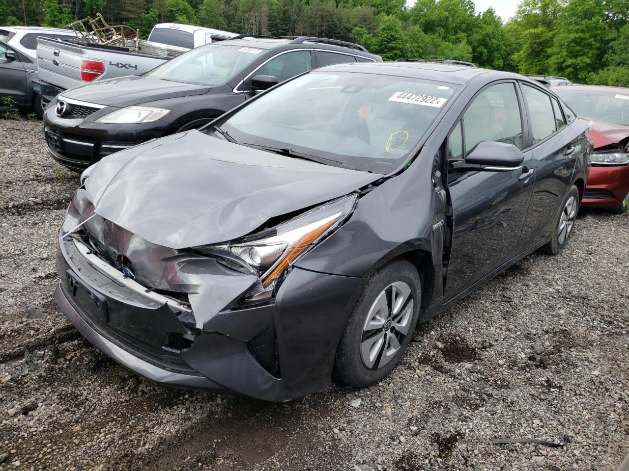 Photo 2 from auction – 2016 TOYOTA PRIUS with VIN JTDKARFUXG3003274