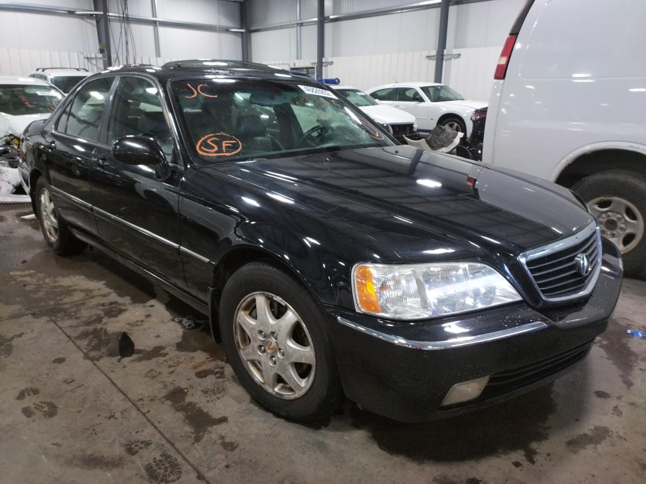 ACURA 3.5RL 2002 with VIN JH4KA96512C010033 - Photo from auction