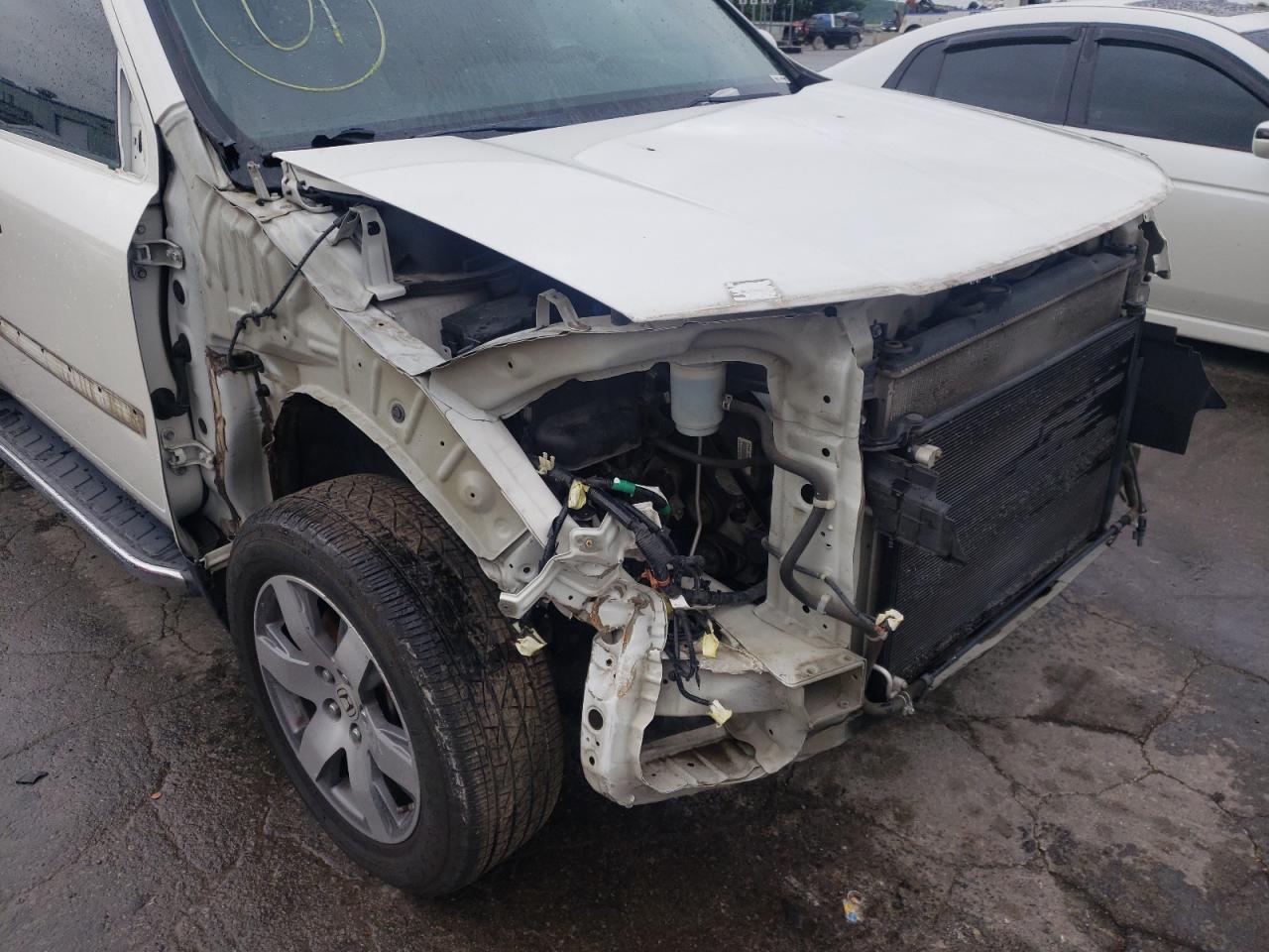 Photo 20 from auction – 2014 HONDA PILOT TOUR with VIN 5FNYF3H95EB007797