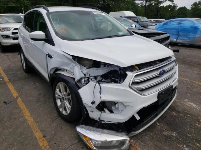 FORD ESCAPE SE 2018 with VIN 1FMCU9GD8JUB07575 - Photo from auction