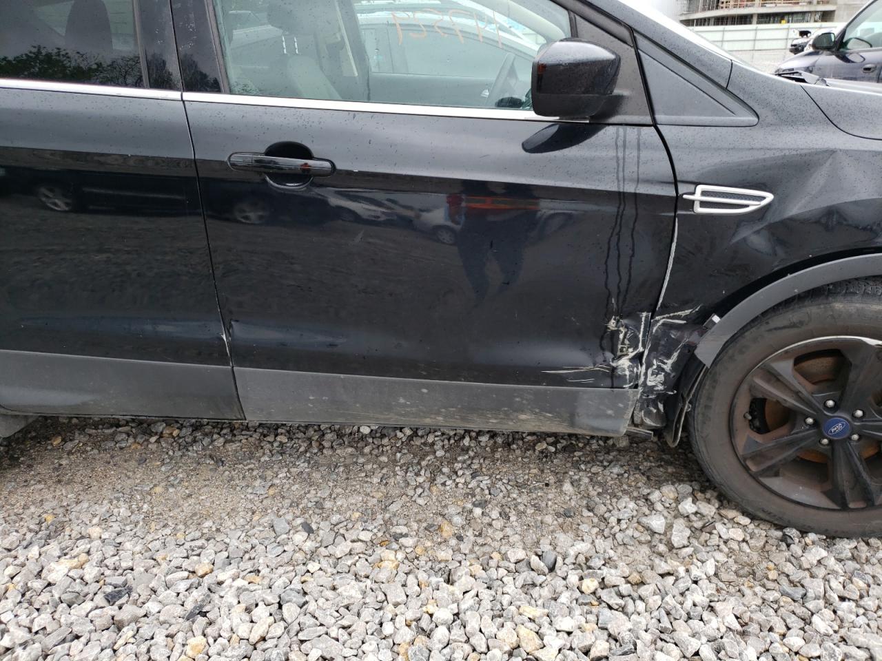 Photo 9 from auction – 2016 FORD ESCAPE SE with VIN 1FMCU0GX7GUB83254