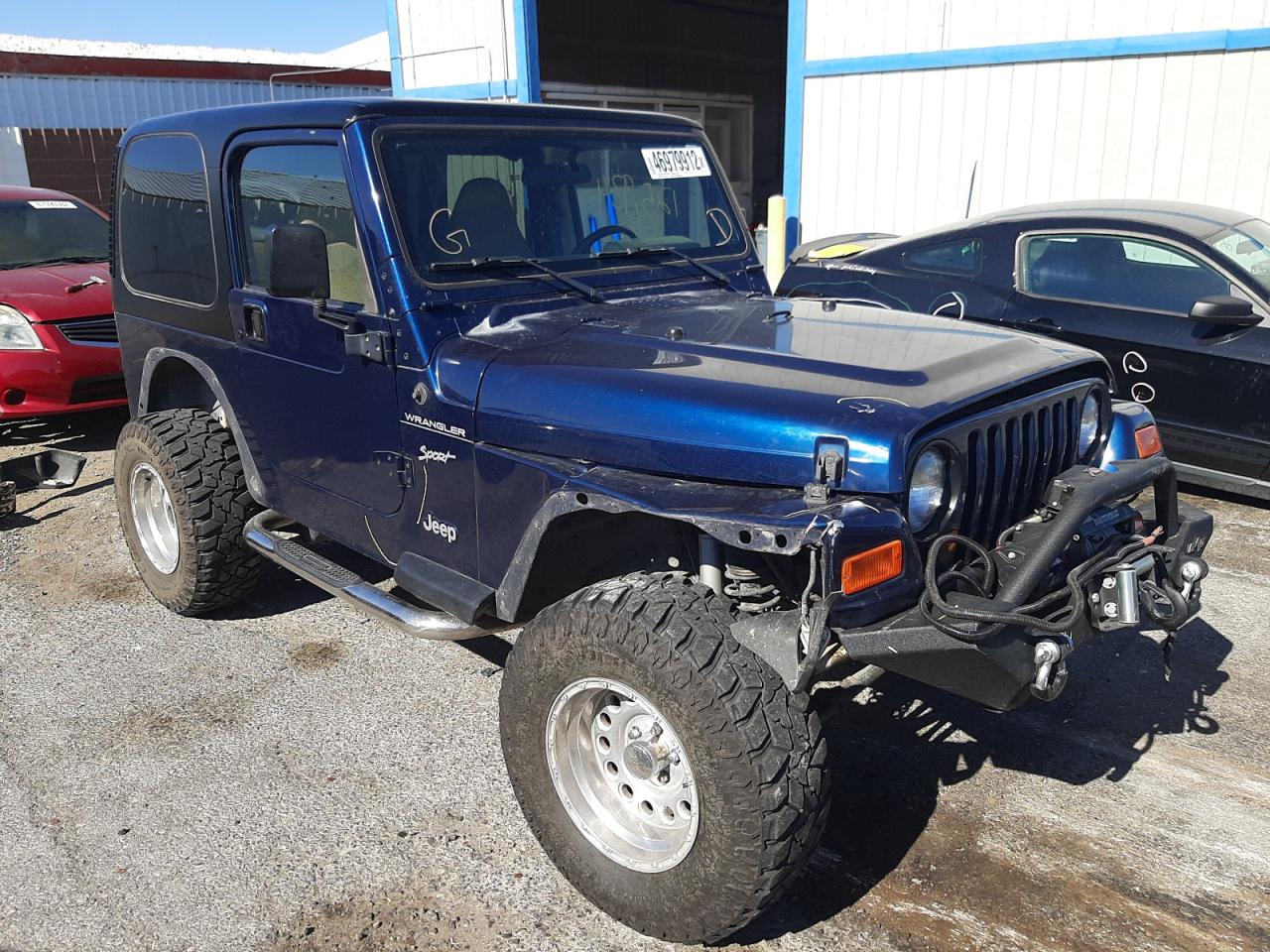 JEEP WRANGLER / 2002 with VIN 1J4FA49S82P761849 - Photo from auction
