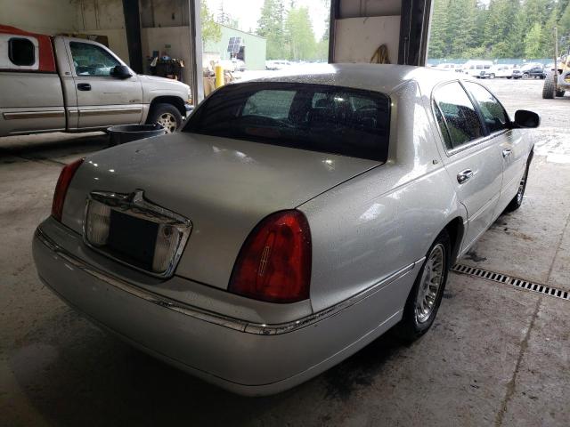 Photo 4 from auction – 2002 LINCOLN TOWN CAR C with VIN 1LNHM83W22Y647120