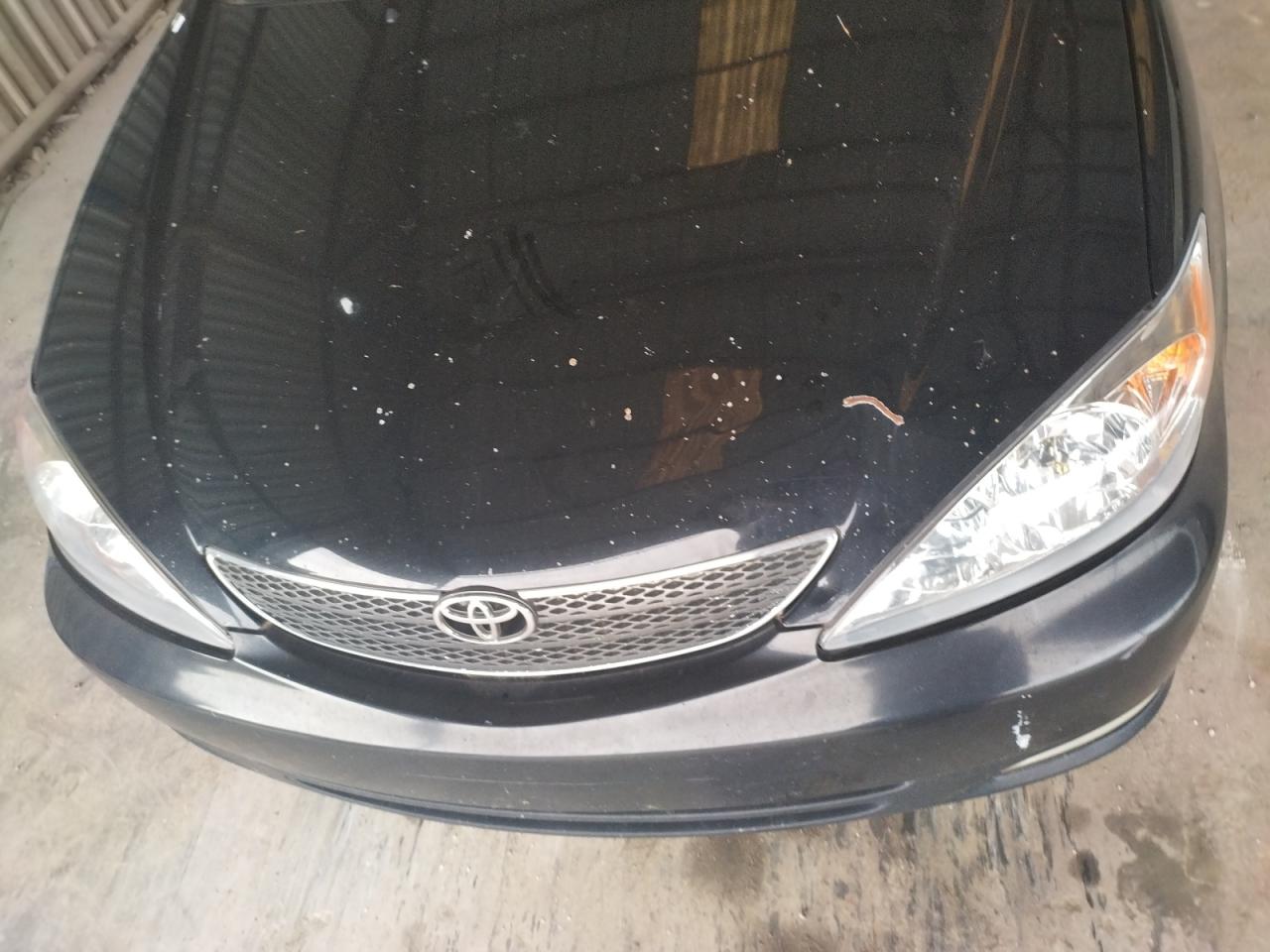 Photo 9 from auction – 2004 TOYOTA CAMRY LE with VIN 4T1BE30K34U293609