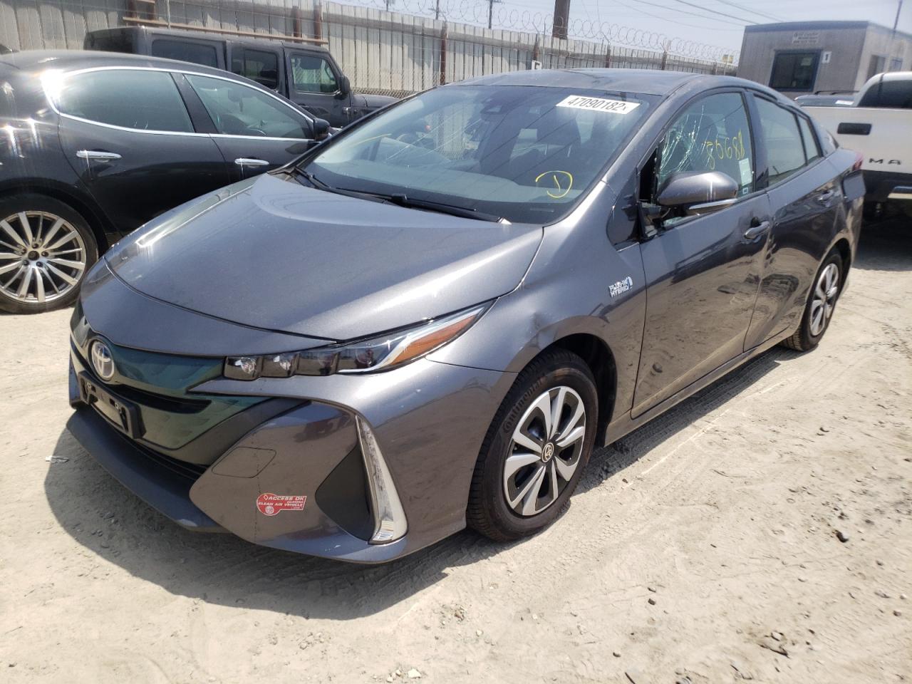 Photo 2 from auction – 2018 TOYOTA PRIUS PRIM with VIN JTDKARFP1J3085168