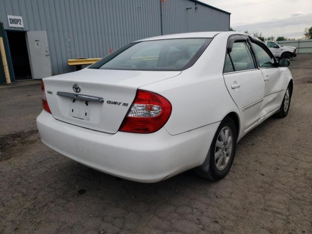 Photo 7 from auction – 2003 TOYOTA CAMRY LE with VIN 4T1BE30K23U196755