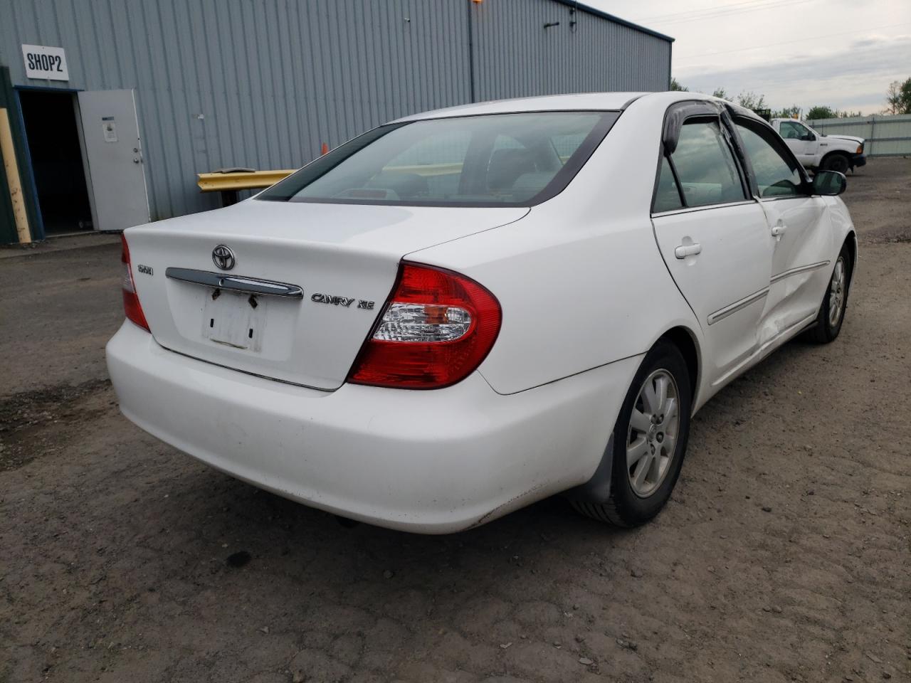Photo 17 from auction – 2003 TOYOTA CAMRY LE with VIN 4T1BE30K23U196755