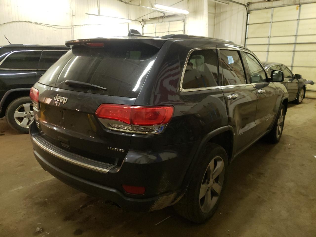 Photo 4 from auction – 2014 JEEP GRAND CHER with VIN 1C4RJFBG0EC557921