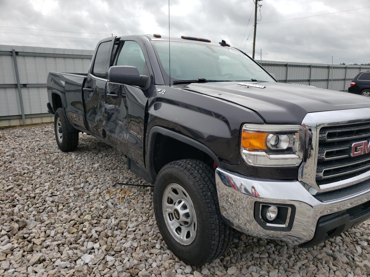 Photo 9 from auction – 2015 GMC SIERRA K25 with VIN 1GT22YE87FZ144813