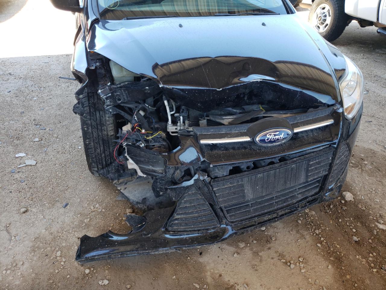 Photo 9 from auction – 2013 FORD FOCUS S with VIN 1FADP3E25DL276774
