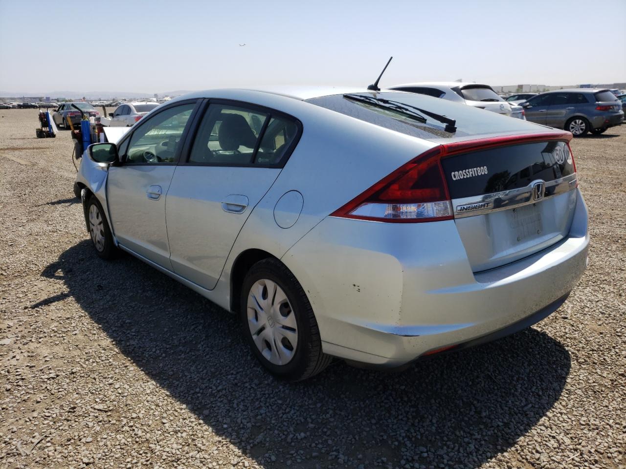 Photo 3 from auction – 2013 HONDA INSIGHT LX with VIN JHMZE2H51DS005754