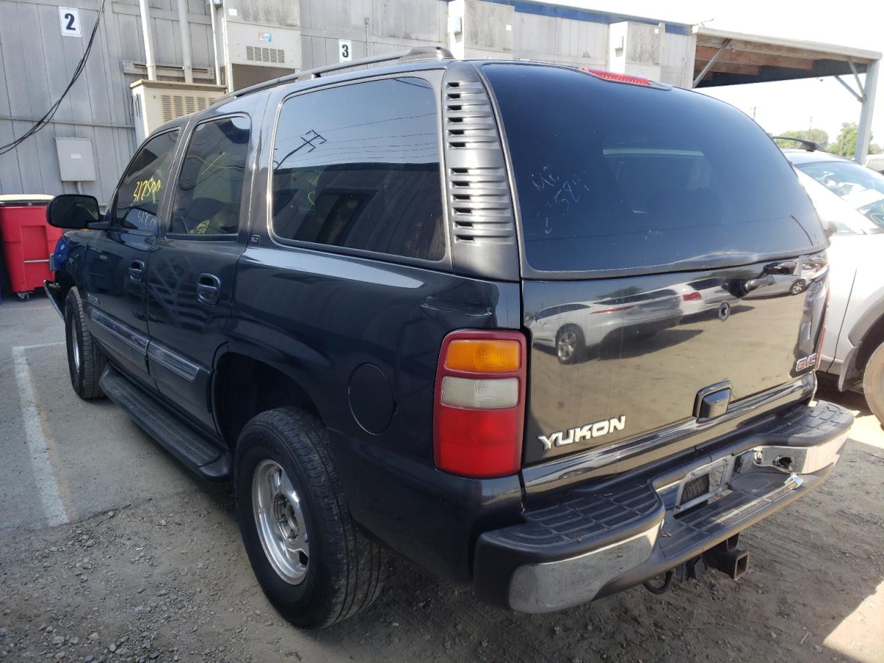 Photo 16 from auction – 2003 GMC YUKON with VIN 1GKEC13T83R149432