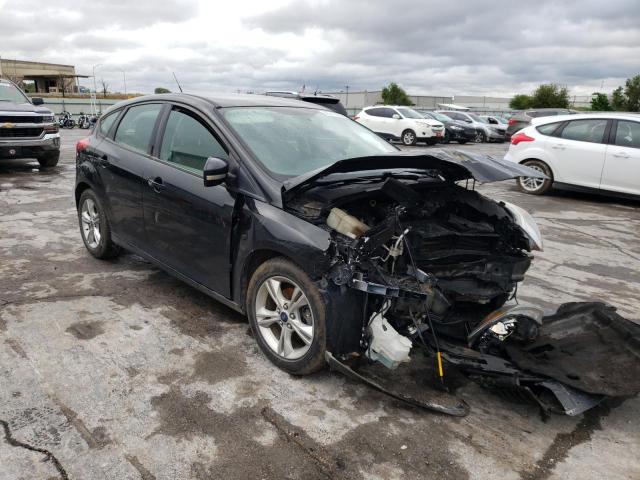 FORD FOCUS SE 2014 with VIN 1FADP3K21EL153477 - Photo from auction