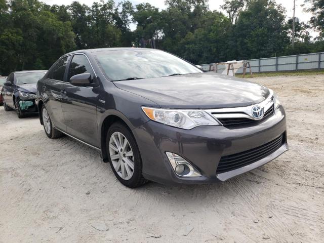 Photo 1 from auction – 2014 TOYOTA CAMRY HYBR with VIN 4T1BD1FKXEU098459