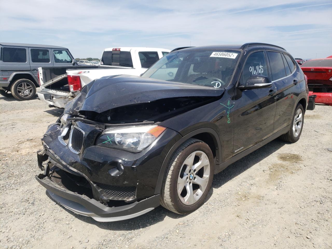 Photo 14 from auction – 2015 BMW X1 SDRIVE2 with VIN WBAVM1C5XFVW57601