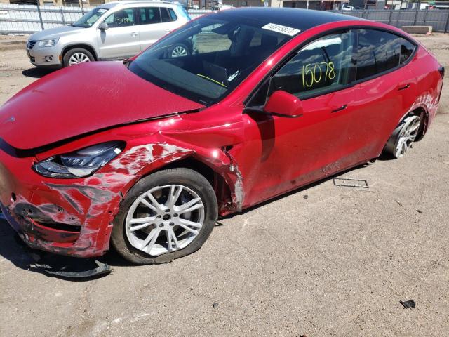 Photo 9 from auction – 2021 TESLA MODEL Y with VIN 5YJYGDEE7MF248084
