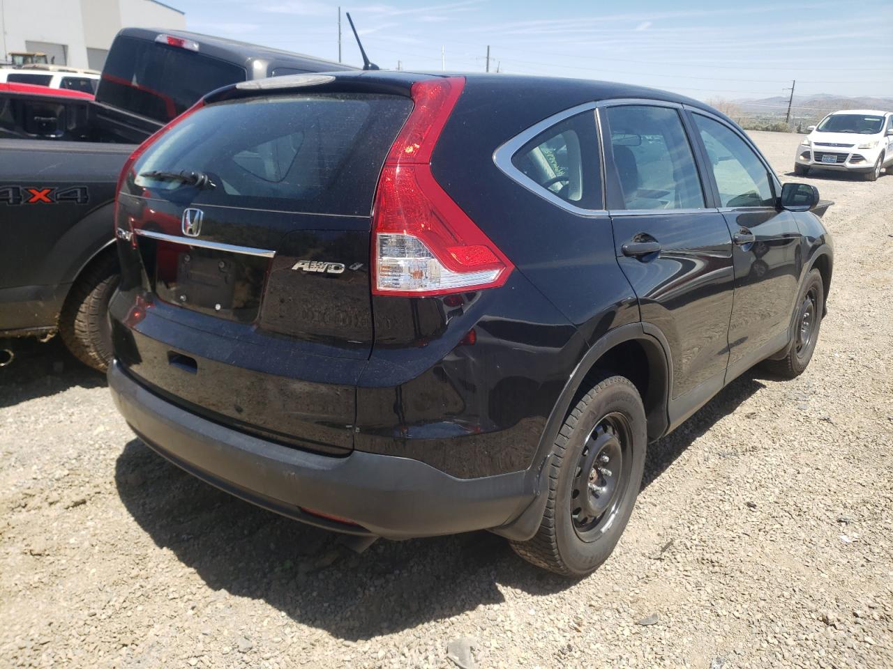 Photo 17 from auction – 2014 HONDA CR-V LX with VIN 2HKRM4H33EH680178