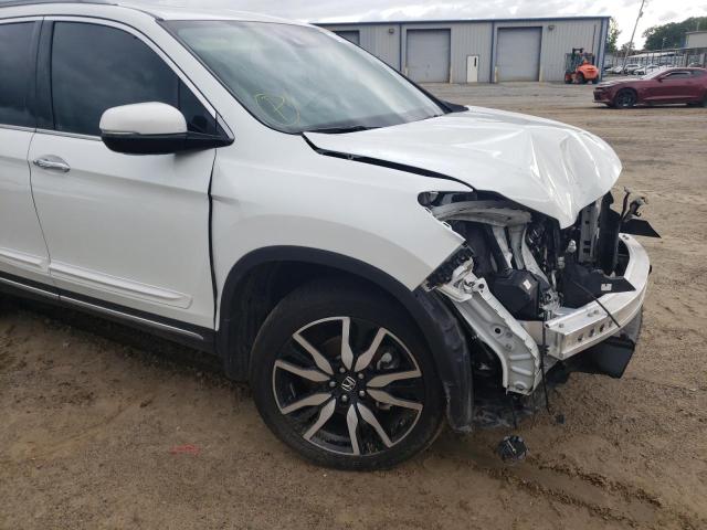 Photo 9 from auction – 2021 HONDA PILOT TOUR with VIN 5FNYF6H62MB092457
