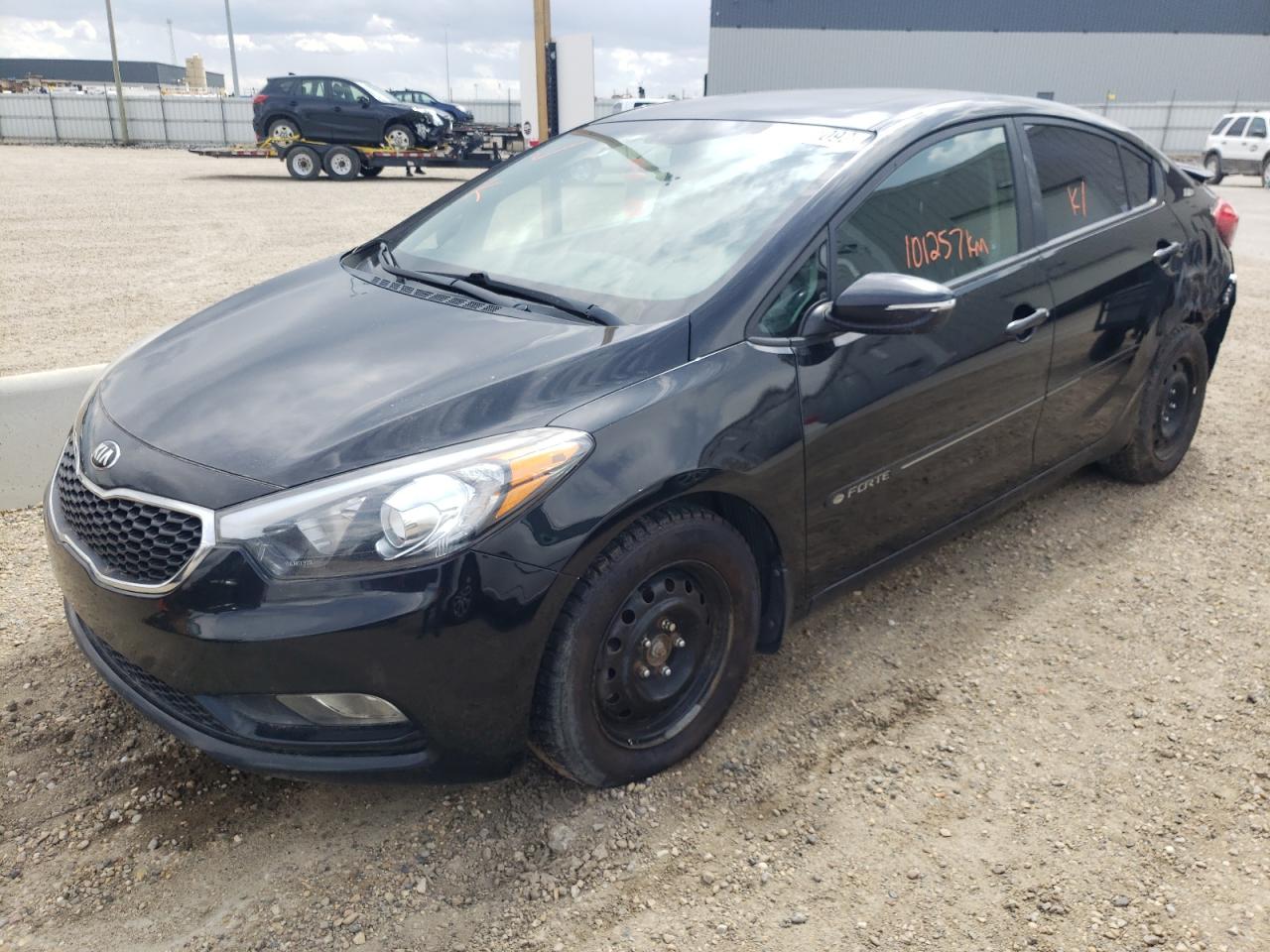 Photo 15 from auction – 2015 KIA FORTE LX with VIN KNAFX4A62F5345149