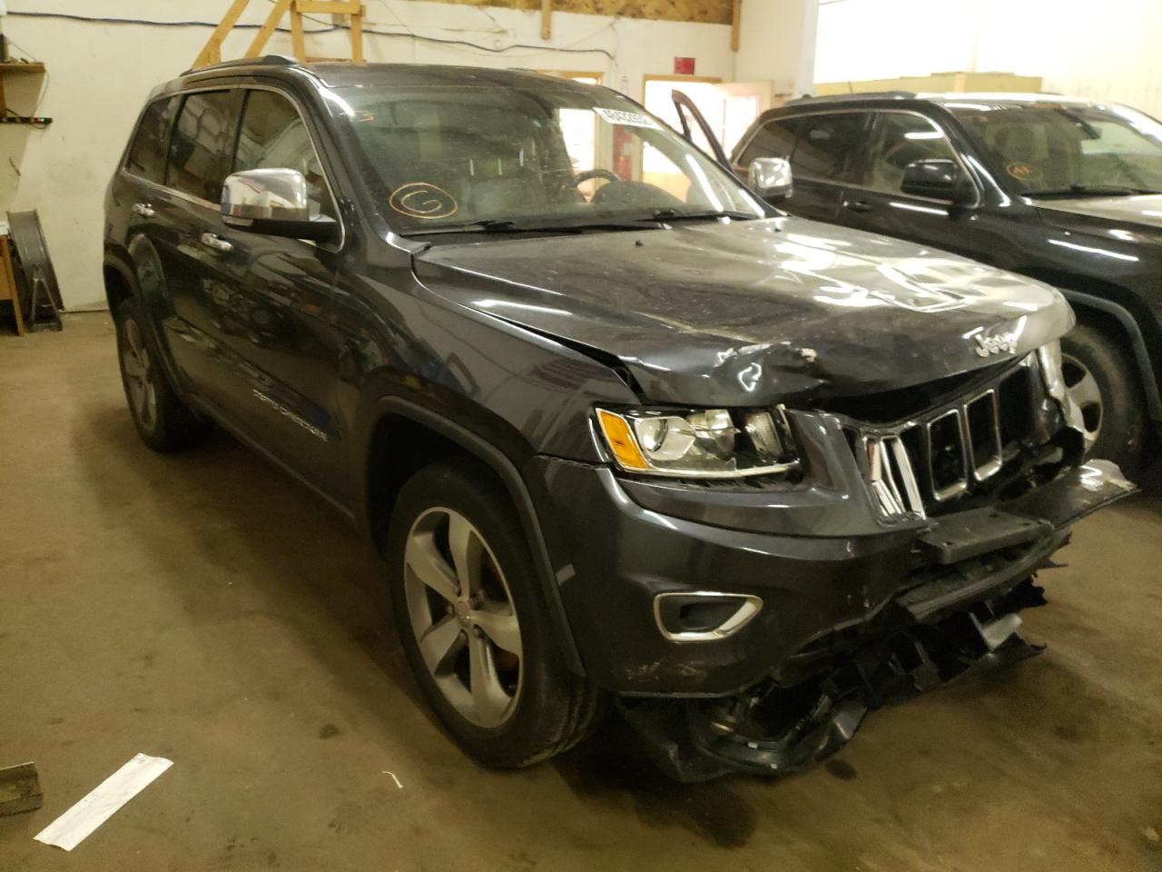 JEEP GRAND CHER 2014 with VIN 1C4RJFBG0EC557921 - Photo from auction