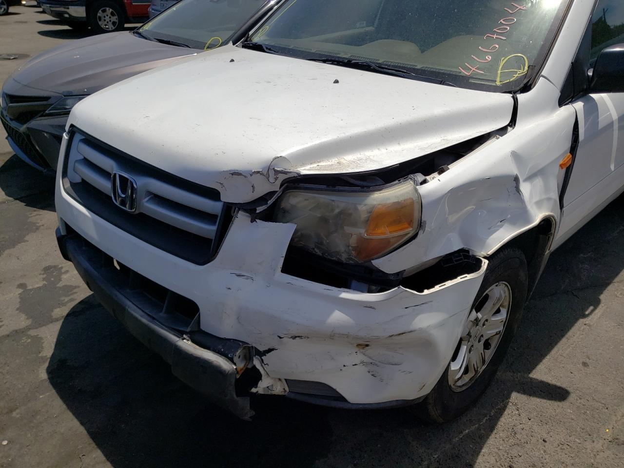 Photo 9 from auction – 2007 HONDA PILOT LX with VIN 5FNYF18107B021513