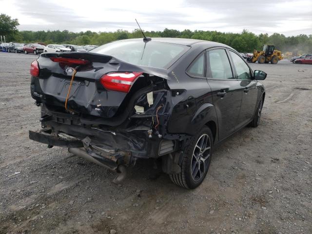 Photo 4 from auction – 2017 FORD FOCUS SEL with VIN 1FADP3H26HL338619