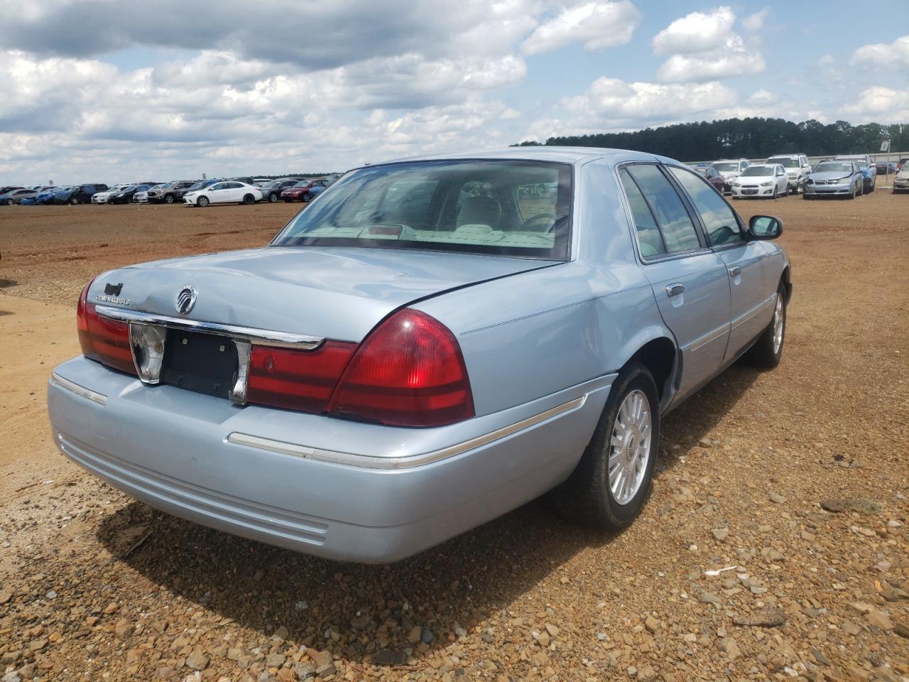 Photo 4 from auction – 2003 MERCURY GRAND MARQ with VIN 2MEFM75W23X607459