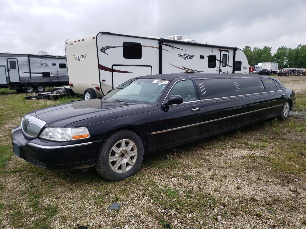 Photo 2 from auction – 2011 LINCOLN TOWN CAR E with VIN 2L1FL8JW1BX751256