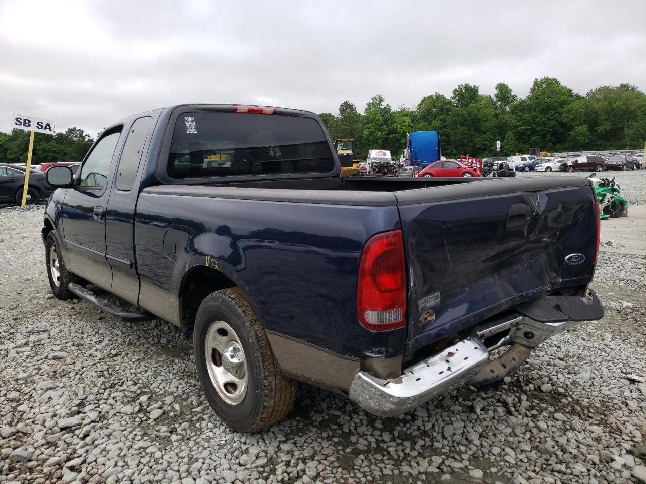 Photo 3 from auction – 2003 FORD F150 with VIN 1FTRX17203NA90953