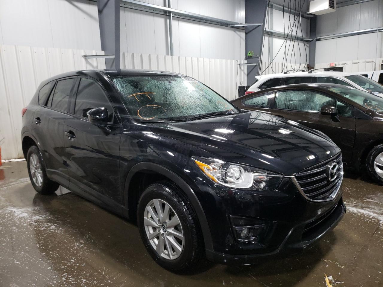 MAZDA CX-5 TOURI 2016 with VIN JM3KE4CY6G0882523 - Photo from auction