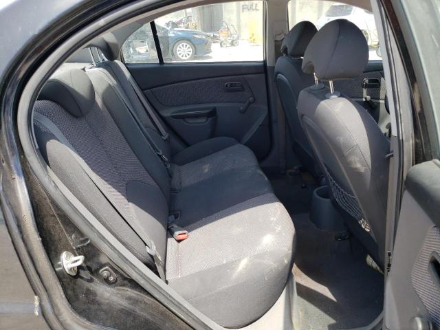Photo 6 from auction – 2011 KIA RIO BASE with VIN KNADH4A37B6937032