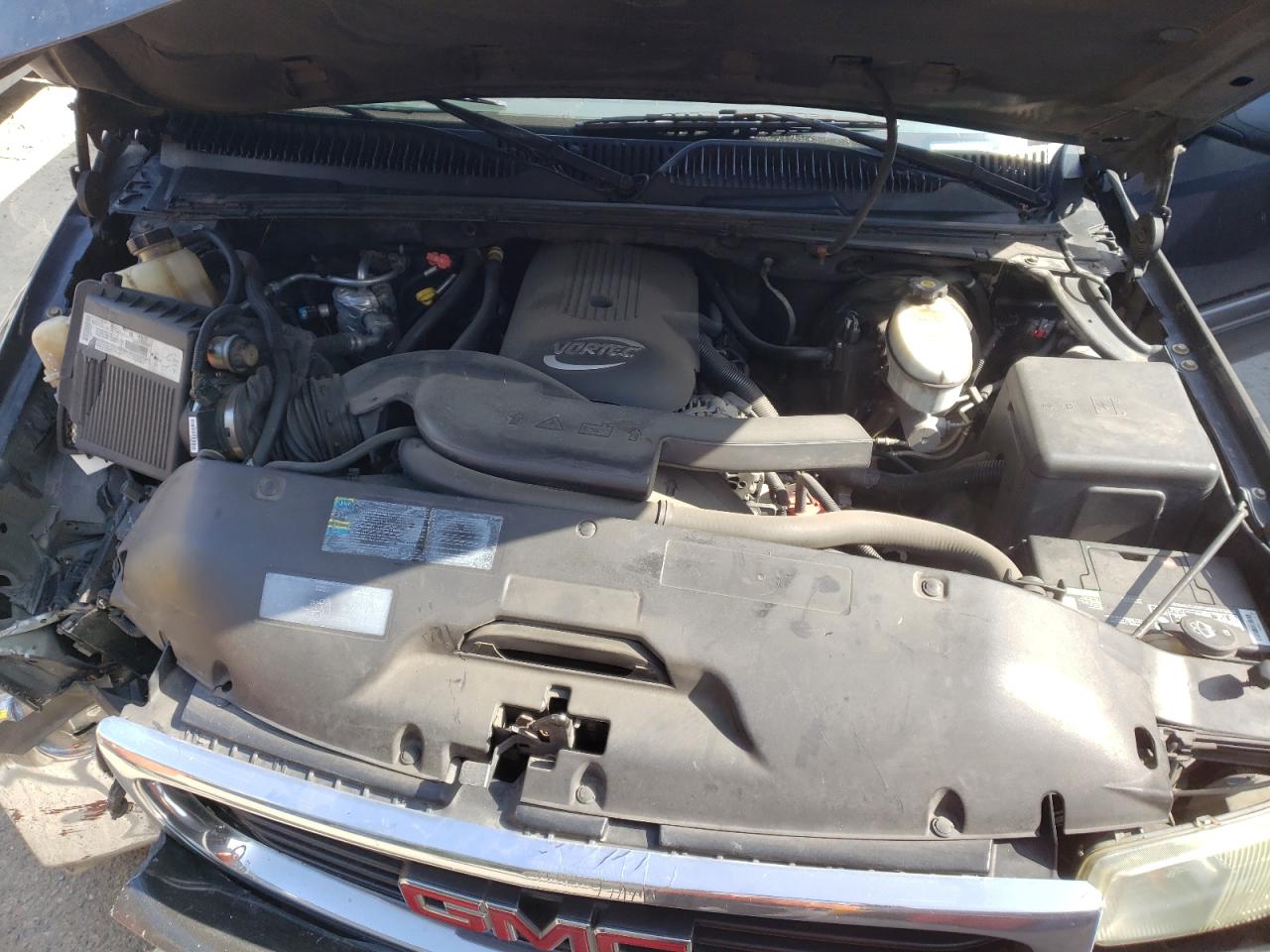 Photo 12 from auction – 2003 GMC YUKON with VIN 1GKEC13T83R149432