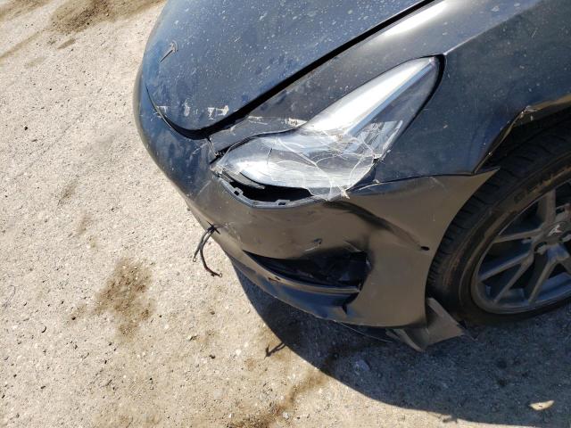 Photo 9 from auction – 2018 TESLA MODEL 3 with VIN 5YJ3E1EA4JF012564