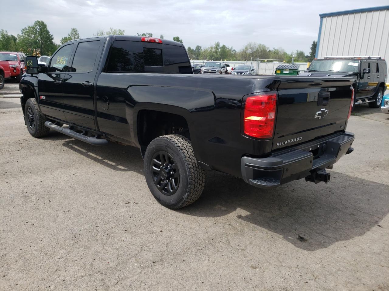Photo 3 from auction – 2017 CHEVROLET SILVERADO with VIN 1GC4K0CY7HF175769