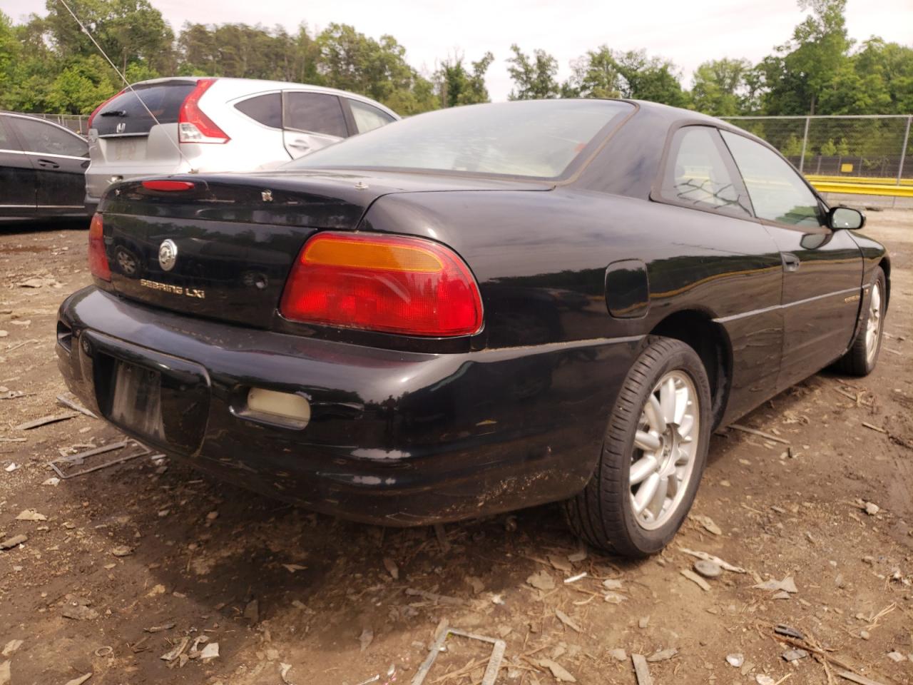 Foto 4 de la subasta – 2000 CHRYSLER SEBRING LX con VIN 4C3AU52N4YE097073
