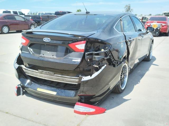 Photo 4 from auction – 2016 FORD FUSION TIT with VIN 3FA6P0D98GR343704