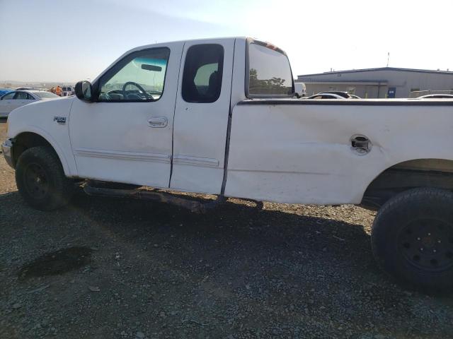 Photo 9 from auction – 1999 FORD F150 with VIN 1FTRX18L7XKA72075