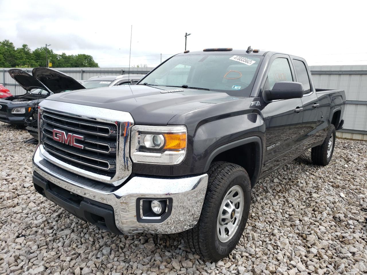 Photo 2 from auction – 2015 GMC SIERRA K25 with VIN 1GT22YE87FZ144813