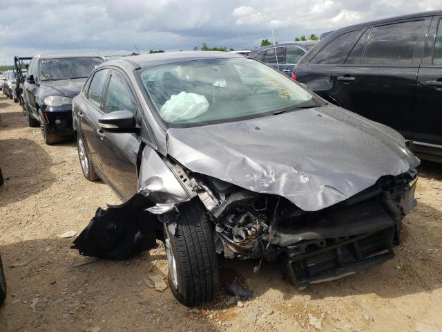 FORD FOCUS SE 2014 with VIN 1FADP3F28EL390512 - Photo from auction