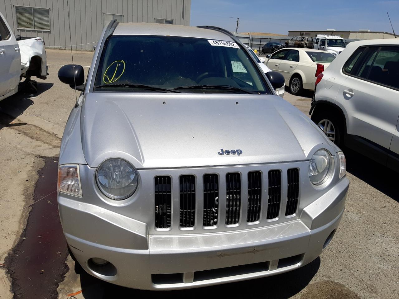 Photo 9 from auction – 2010 JEEP COMPASS SP with VIN 1J4NF4FB0AD649628