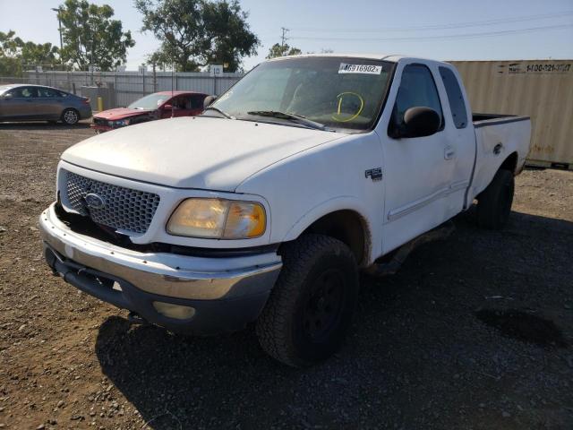 Photo 2 from auction – 1999 FORD F150 with VIN 1FTRX18L7XKA72075