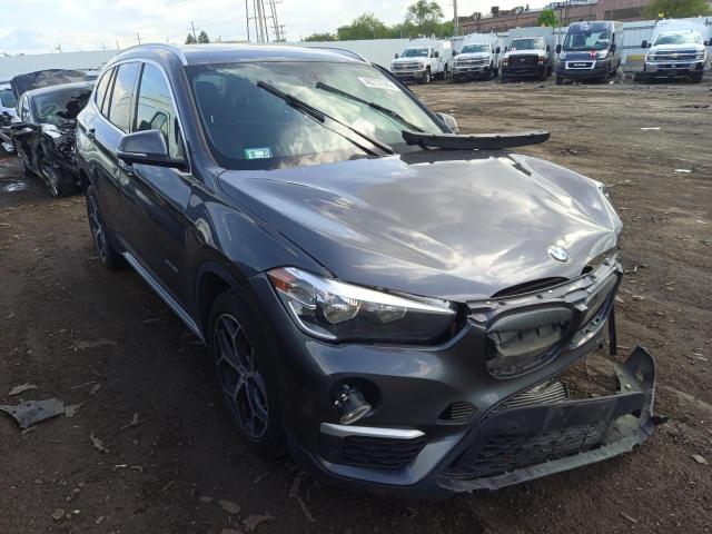 BMW X1 XDRIVE2 2018 with VIN WBXHT3Z3XJ4A66693 - Photo from auction