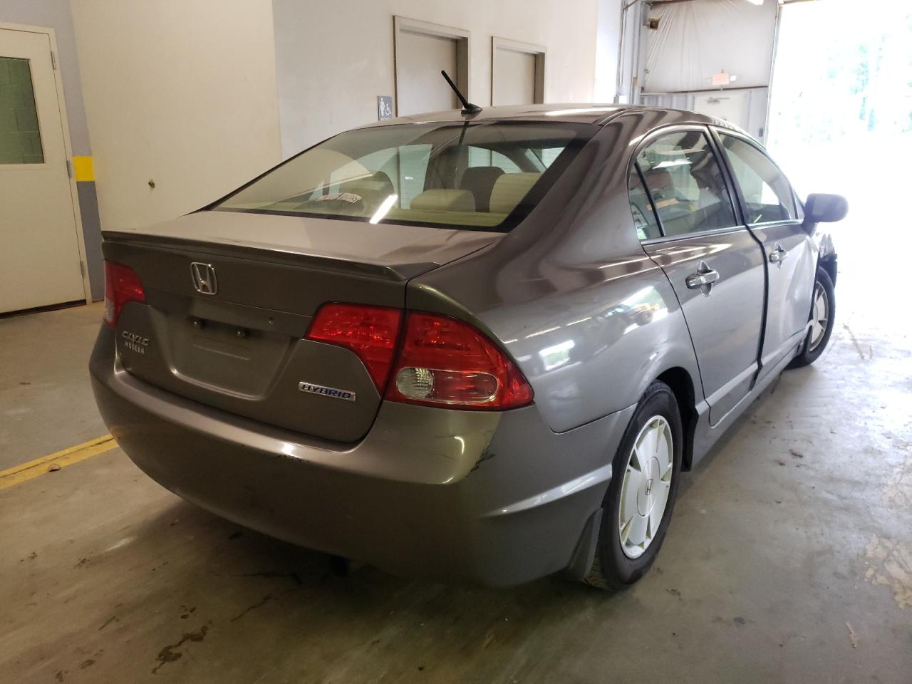 Photo 17 from auction – 2007 HONDA CIVIC HYBR with VIN JHMFA362X7S020125