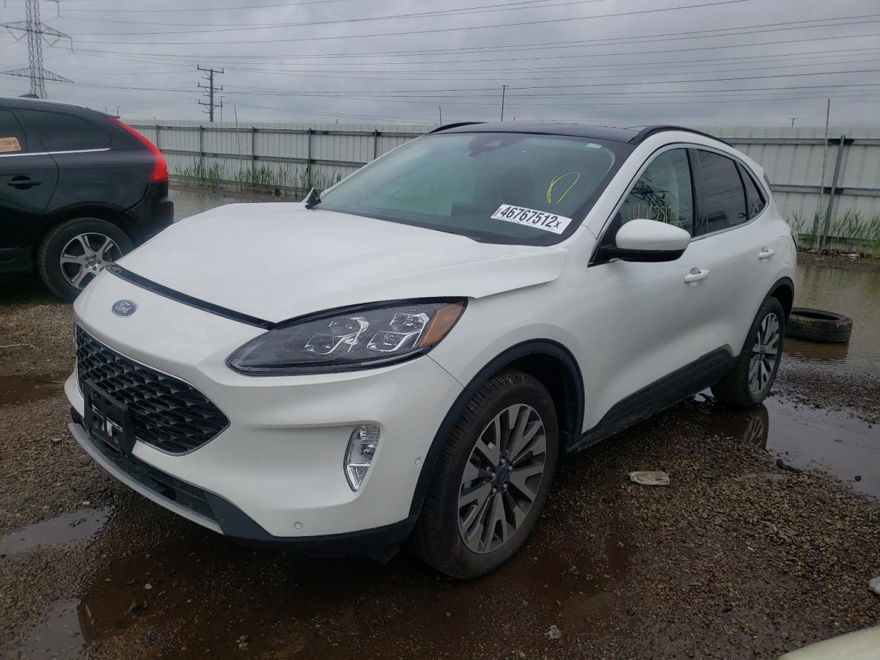 Photo 2 from auction – 2021 FORD ESCAPE TIT with VIN 1FMCU9J91MUB35937