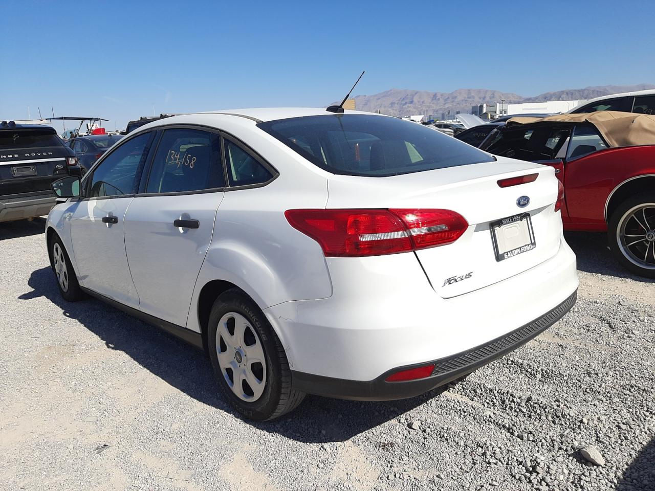 Photo 16 from auction – 2018 FORD FOCUS S with VIN 1FADP3E29JL278703