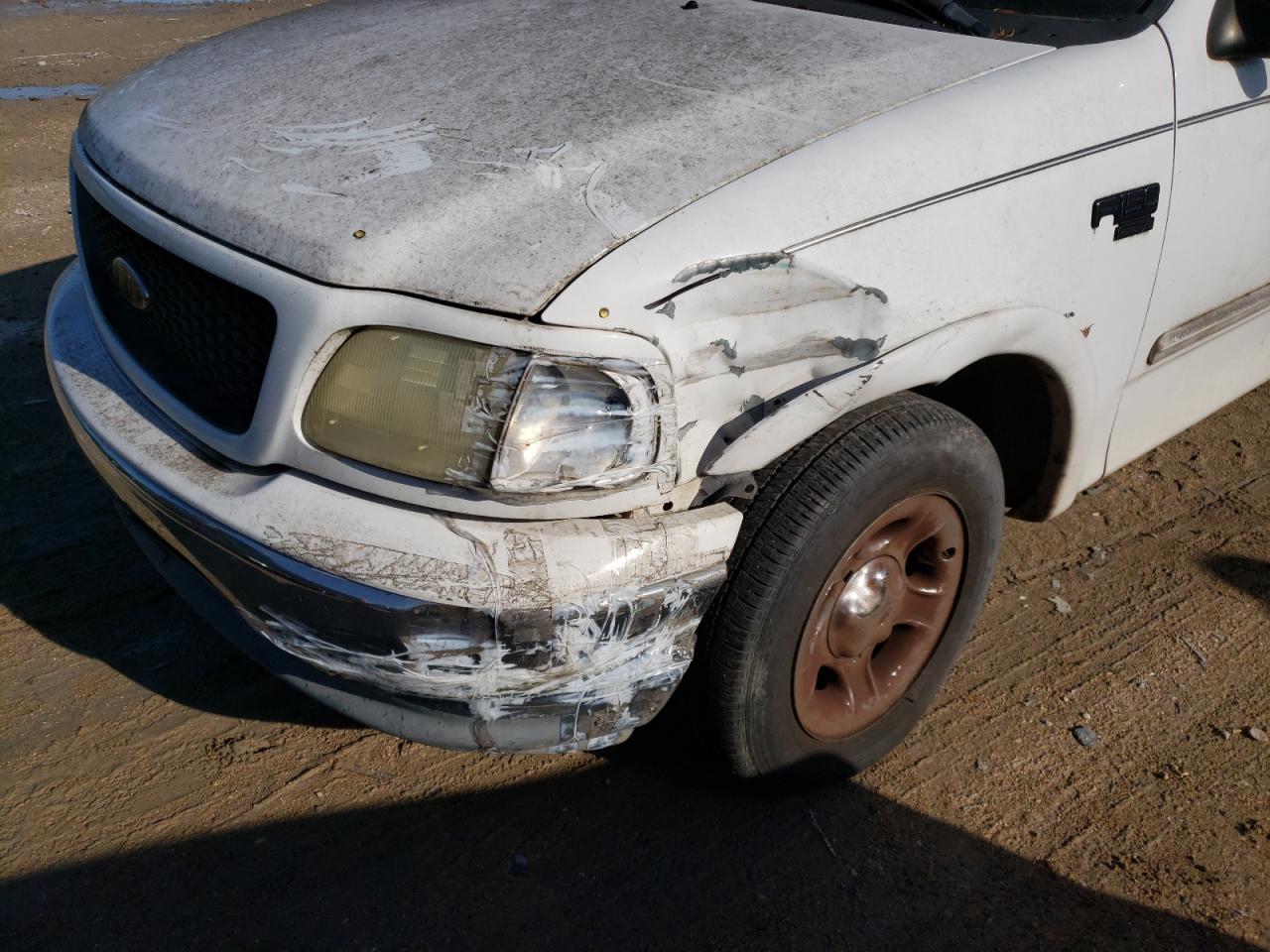 Photo 9 from auction – 2002 FORD F150 with VIN 1FTRX17W62NA28183