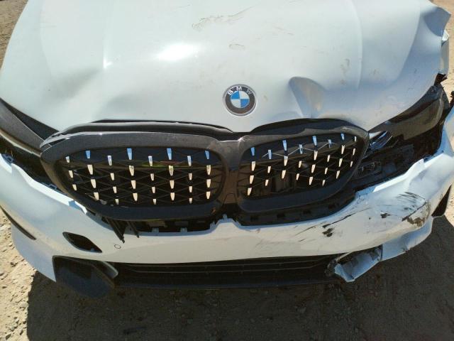 Photo 7 from auction – 2020 BMW 330I with VIN 3MW5R1J08L8B04467