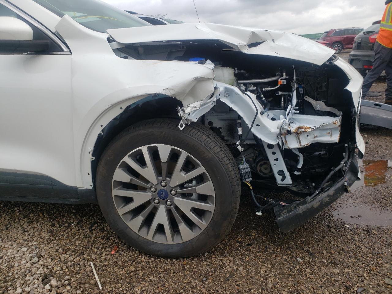 Photo 9 from auction – 2021 FORD ESCAPE TIT with VIN 1FMCU9J91MUB35937