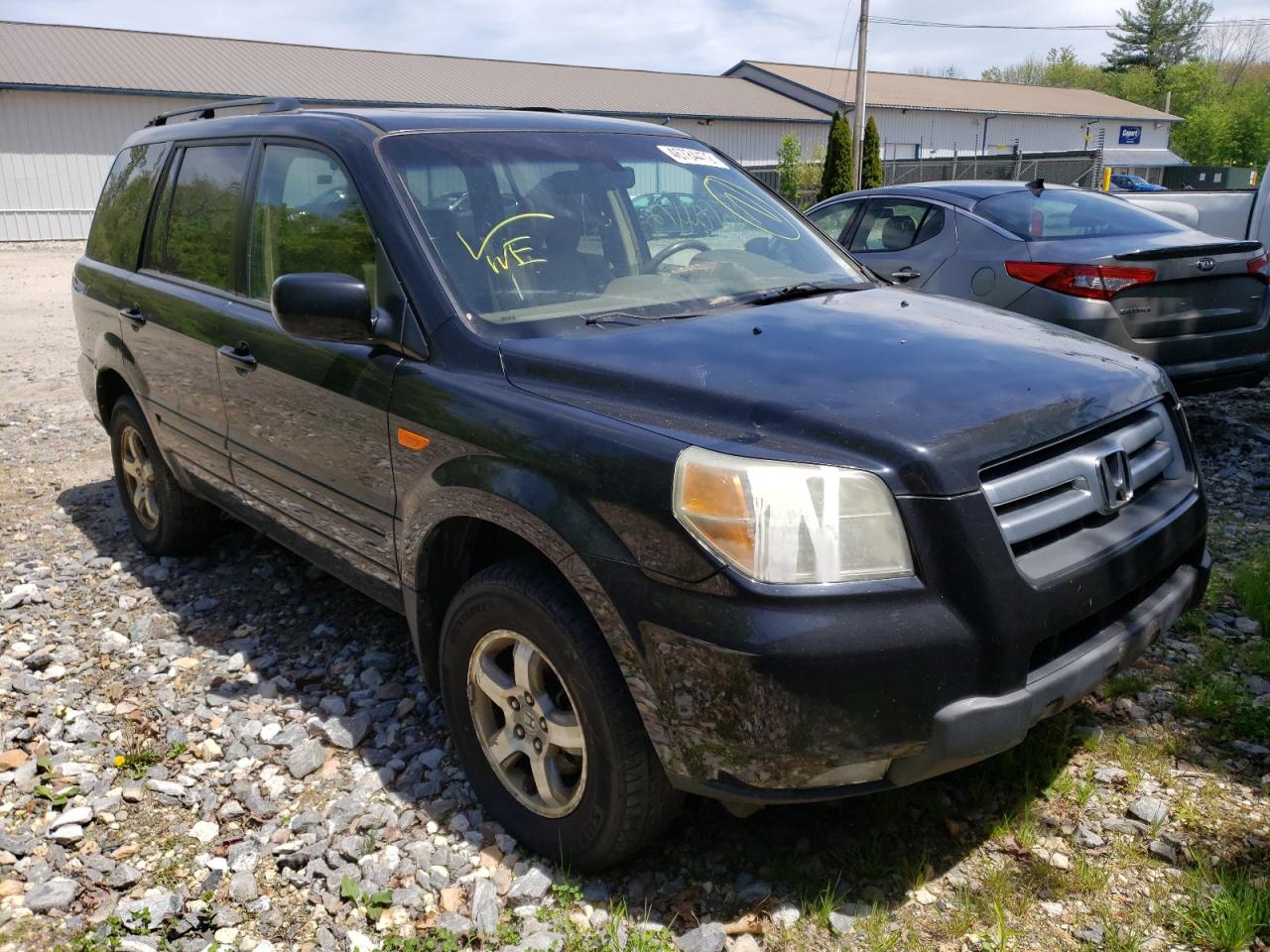 Photo 14 from auction – 2006 HONDA PILOT EX with VIN 2HKYF18536H547766